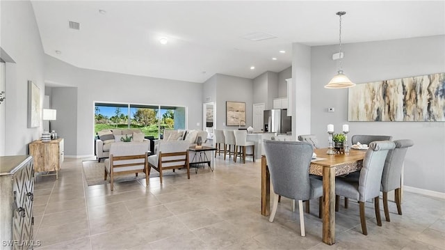 722 SW 7th Ter, Cape Coral, FL 33991 - dining room featuring high vaulted ceiling, baseboards, light tile patterned floors, and recessed lighting