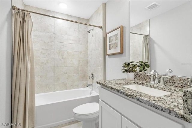 722 SW 7th Ter, Cape Coral, FL 33991 - bathroom featuring shower / tub combo, toilet, and vanity