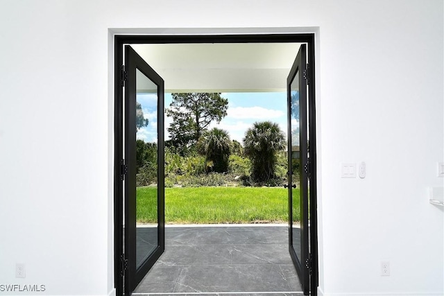 3808 2nd St W, Lehigh Acres, FL 33971 - doorway featuring plenty of natural light