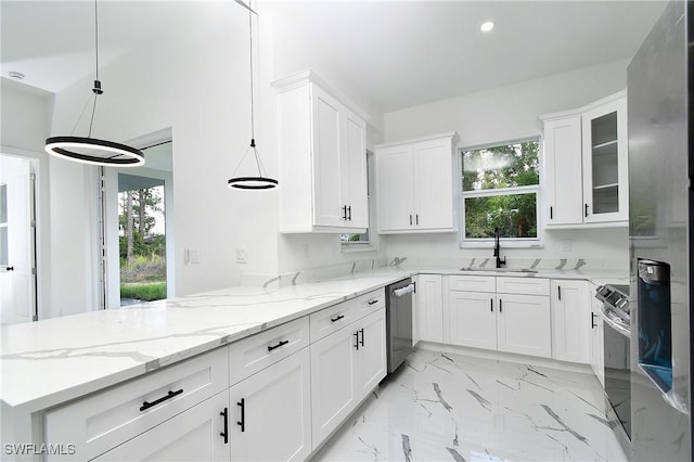 3808 2nd St W, Lehigh Acres, FL 33971 - kitchen featuring a sink, appliances with stainless steel finishes, a peninsula, white cabinets, and recessed lighting