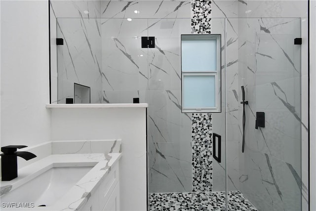 3808 2nd St W, Lehigh Acres, FL 33971 - bathroom with vanity and a marble finish shower