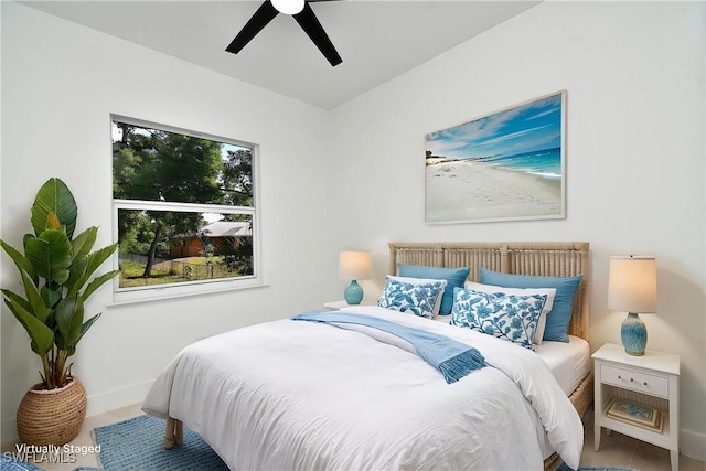3808 2nd St W, Lehigh Acres, FL 33971 - bedroom with baseboards and a ceiling fan