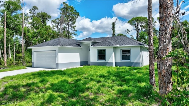 3808 2nd St W, Lehigh Acres, FL 33971 - view of front facade featuring stucco siding, a garage, concrete driveway, a front lawn, and roof with shingles