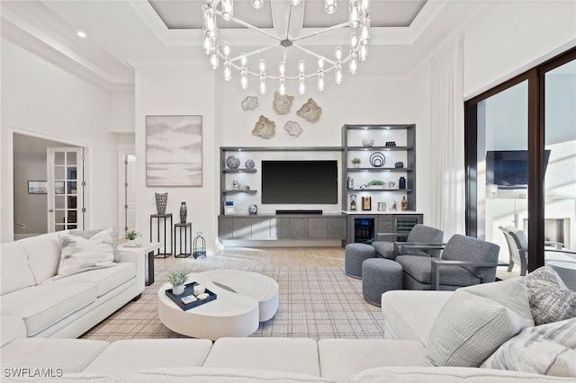 4249 Deephaven Ln, Naples, FL 34119 - living area featuring crown molding and a dry bar