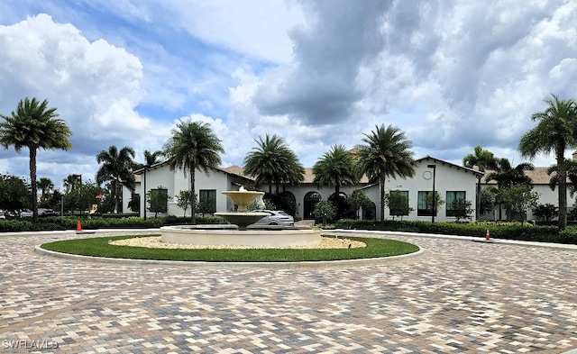 5633 Cassidy Ln, Ave Maria, FL 34142 - view of property's community featuring curved driveway