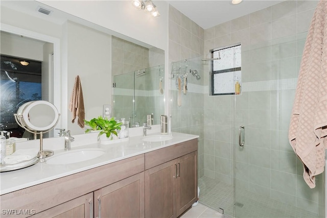 5633 Cassidy Ln, Ave Maria, FL 34142 - bathroom featuring a stall shower and double vanity