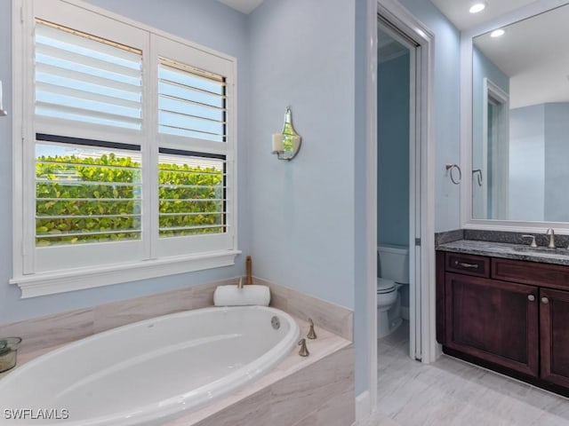 811 Manor Ter, Marco Island, FL 34145 - full bath with toilet, a garden tub, and vanity