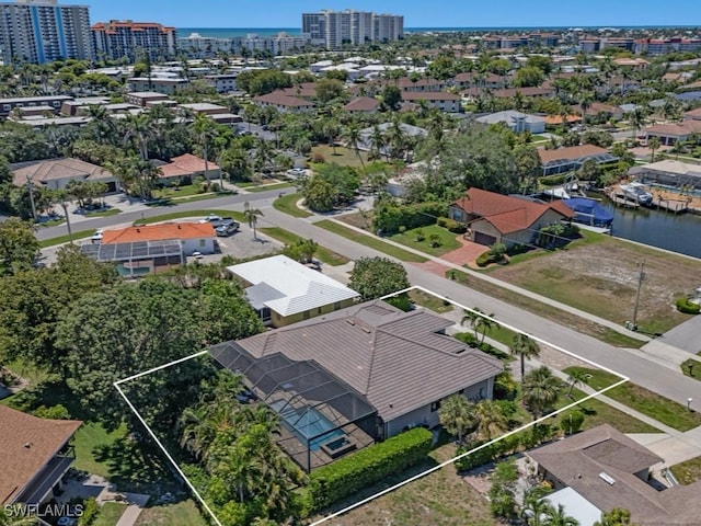 811 Manor Ter, Marco Island, FL 34145 - aerial view of residential area featuring a nearby body of water and property parcel outlined