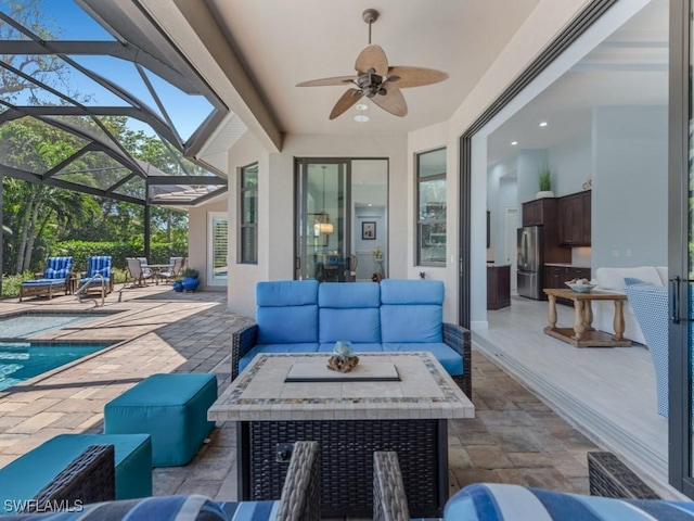 811 Manor Ter, Marco Island, FL 34145 - view of patio featuring an outdoor living space, ceiling fan, glass enclosure, and an outdoor pool