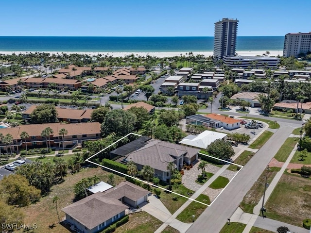 811 Manor Ter, Marco Island, FL 34145 - aerial perspective of suburban area featuring a nearby body of water and property boundaries highlighted