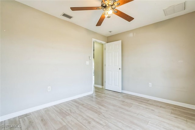 3406 27th St SW, Lehigh Acres, FL 33976 - unfurnished room with a ceiling fan, light wood-type flooring, and baseboards