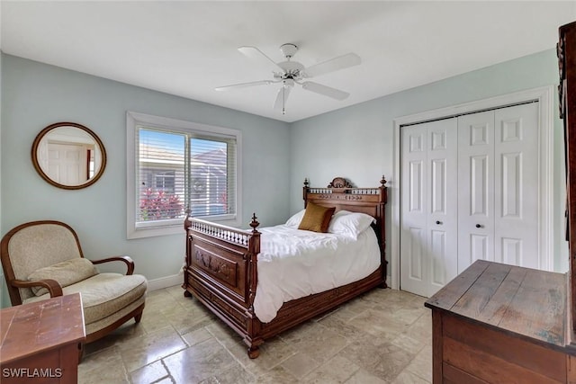 bedroom featuring a closet, baseboards, and ceiling fan
