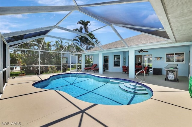 swimming pool featuring a patio area and a ceiling fan