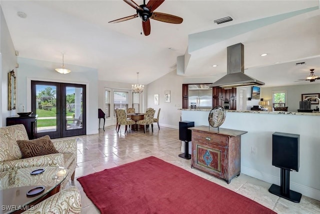 living area featuring ceiling fan, french doors, a chandelier, baseboards, and lofted ceiling