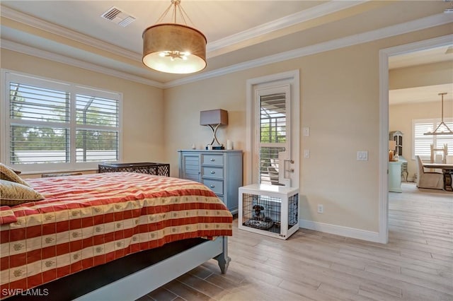 9292 Cayman Dr, Naples, FL 34114 - bedroom featuring light wood-style flooring, baseboards, and crown molding