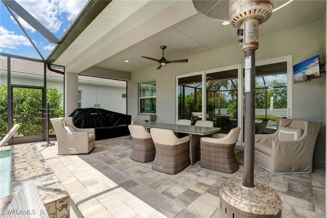 9292 Cayman Dr, Naples, FL 34114 - view of patio featuring a ceiling fan, glass enclosure, and outdoor dining area