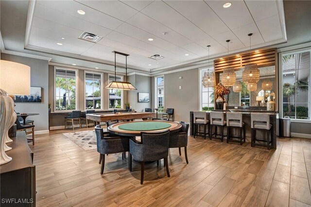 9292 Cayman Dr, Naples, FL 34114 - playroom with wood finished floors, baseboards, recessed lighting, and crown molding