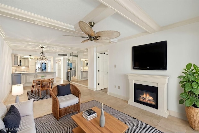 25900 Hickory Blvd Unit 504, Bonita Springs, FL 34134 - living room featuring light tile patterned floors, a glass covered fireplace, a ceiling fan, beamed ceiling, and ornamental molding