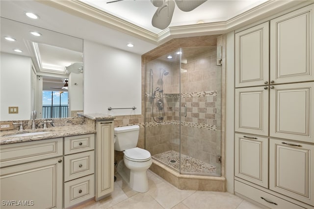 25900 Hickory Blvd Unit 504, Bonita Springs, FL 34134 - full bathroom featuring toilet, tile patterned flooring, vanity, ceiling fan, and a stall shower