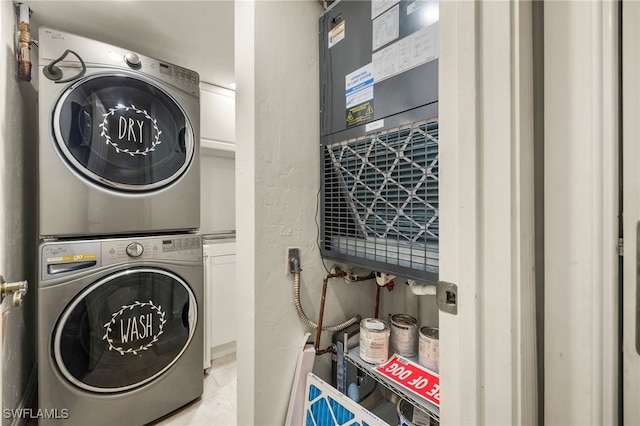 25900 Hickory Blvd Unit 504, Bonita Springs, FL 34134 - washroom with stacked washer / drying machine