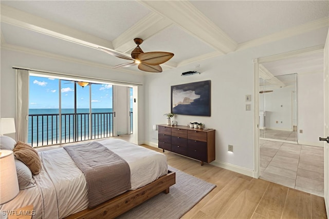 25900 Hickory Blvd Unit 504, Bonita Springs, FL 34134 - bedroom featuring access to exterior, a water view, beamed ceiling, baseboards, and coffered ceiling