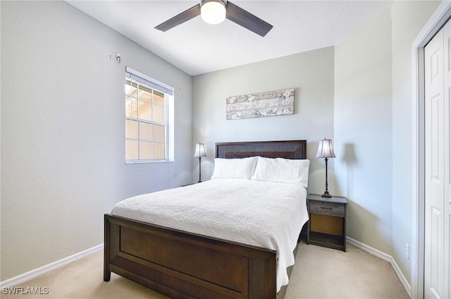 13891 Lake Mahogany Blvd Unit 3123, Fort Myers, FL 33907 - bedroom featuring light colored carpet, baseboards, and a ceiling fan