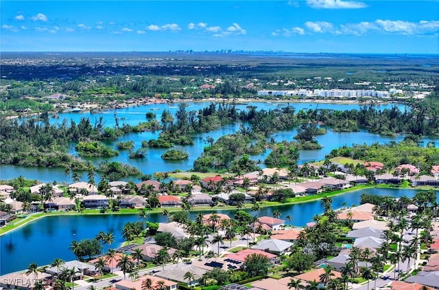 13891 Lake Mahogany Blvd Unit 3123, Fort Myers, FL 33907 - aerial perspective of suburban area featuring a large body of water