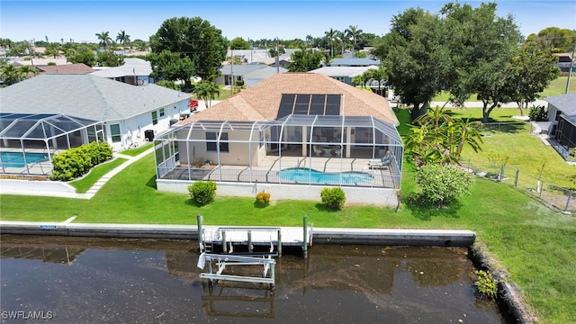 2010 SE 13th Ter, Cape Coral, FL 33990 - aerial perspective of suburban area featuring a pool and a large body of water