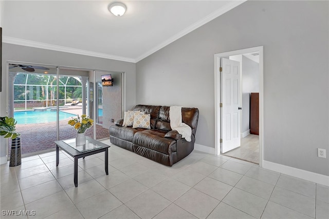 6700 Eagle Tree Ct, North Fort Myers, FL 33917 - living room with lofted ceiling, ornamental molding, baseboards, light tile patterned floors, and a sunroom