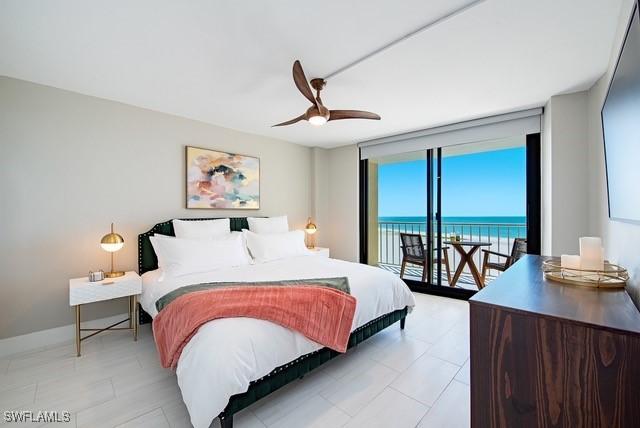 380 Seaview Ct Unit 1704, Marco Island, FL 34145 - bedroom with access to outside, floor to ceiling windows, ceiling fan, and baseboards