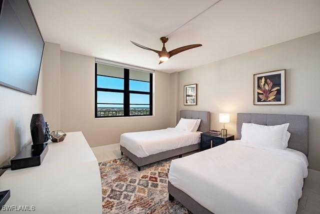 380 Seaview Ct Unit 1704, Marco Island, FL 34145 - bedroom with a ceiling fan