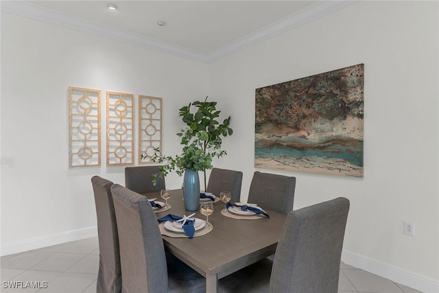 9142 Cherry Oaks Ln Unit 202, Naples, FL 34114 - dining room featuring light tile patterned floors, crown molding, and baseboards