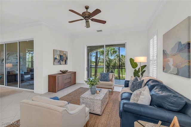 9142 Cherry Oaks Ln Unit 202, Naples, FL 34114 - living area with crown molding, light tile patterned flooring, ceiling fan, and baseboards