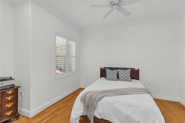 9142 Cherry Oaks Ln Unit 202, Naples, FL 34114 - bedroom featuring light wood-style flooring, baseboards, and a ceiling fan