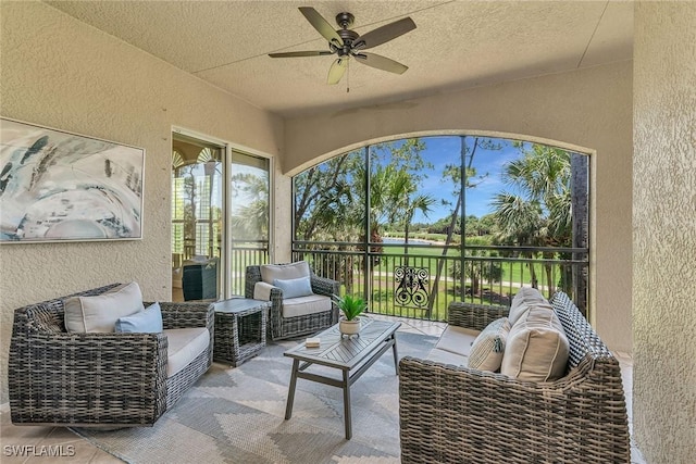9142 Cherry Oaks Ln Unit 202, Naples, FL 34114 - sunroom / solarium featuring a ceiling fan and outdoor lounge area