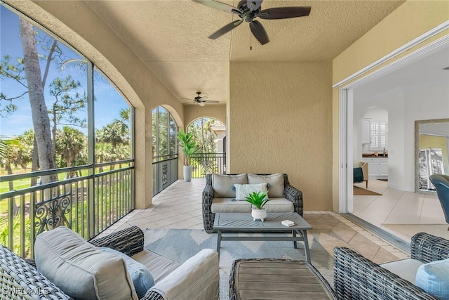 9142 Cherry Oaks Ln Unit 202, Naples, FL 34114 - view of patio with ceiling fan, an outdoor living space, and a balcony