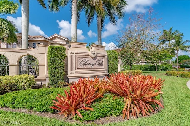9142 Cherry Oaks Ln Unit 202, Naples, FL 34114 - community / neighborhood sign featuring a lawn