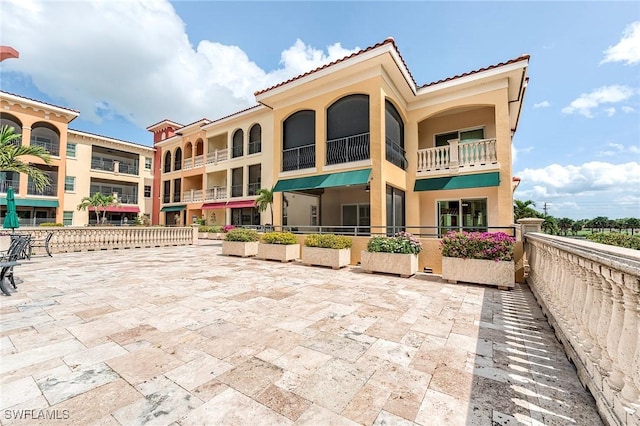 21530 Strada Nuova Cir Unit 215, Estero, FL 33928 - view of building exterior