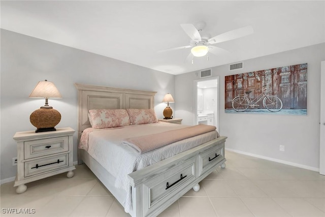 1020 Swallow Ave Unit 102, Marco Island, FL 34145 - bedroom featuring baseboards, ceiling fan, ensuite bathroom, and light tile patterned floors