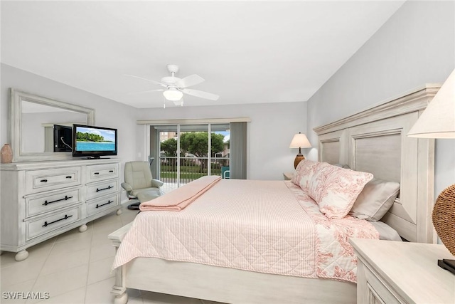 1020 Swallow Ave Unit 102, Marco Island, FL 34145 - bedroom with access to outside, a ceiling fan, and light tile patterned floors