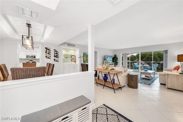 1020 Swallow Ave Unit 102, Marco Island, FL 34145 - living area featuring light tile patterned floors