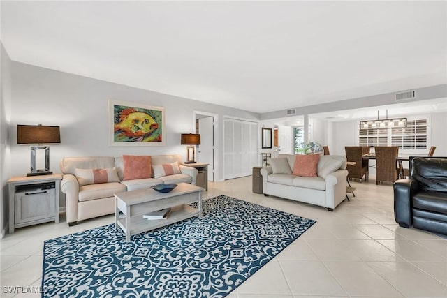 1020 Swallow Ave Unit 102, Marco Island, FL 34145 - living area with light tile patterned floors