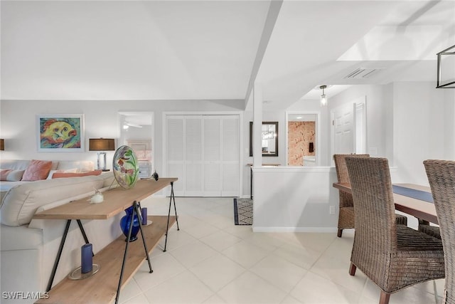 1020 Swallow Ave Unit 102, Marco Island, FL 34145 - dining area featuring baseboards and light tile patterned floors