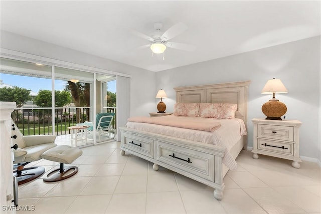 1020 Swallow Ave Unit 102, Marco Island, FL 34145 - bedroom featuring access to outside, light tile patterned flooring, a ceiling fan, and baseboards