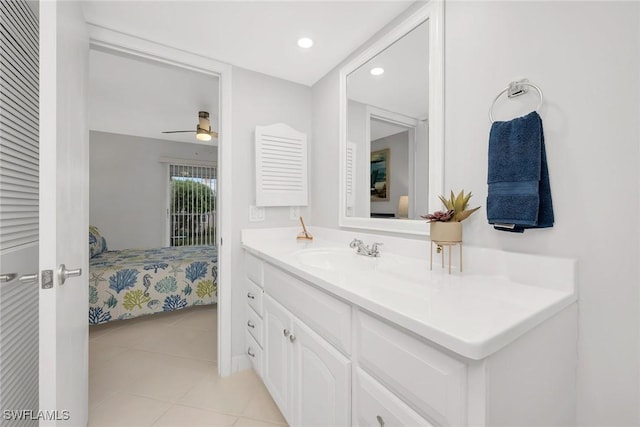 1020 Swallow Ave Unit 102, Marco Island, FL 34145 - ensuite bathroom with a ceiling fan, tile patterned flooring, vanity, and recessed lighting