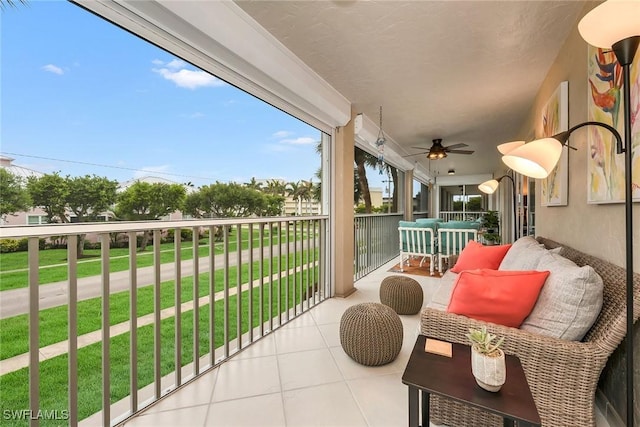 1020 Swallow Ave Unit 102, Marco Island, FL 34145 - balcony featuring a ceiling fan