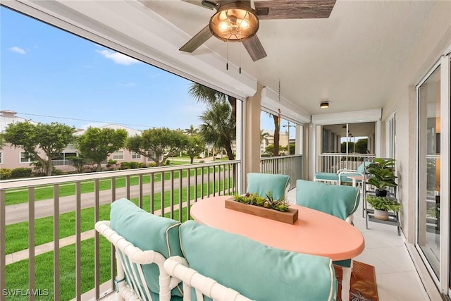 1020 Swallow Ave Unit 102, Marco Island, FL 34145 - sunroom featuring a ceiling fan