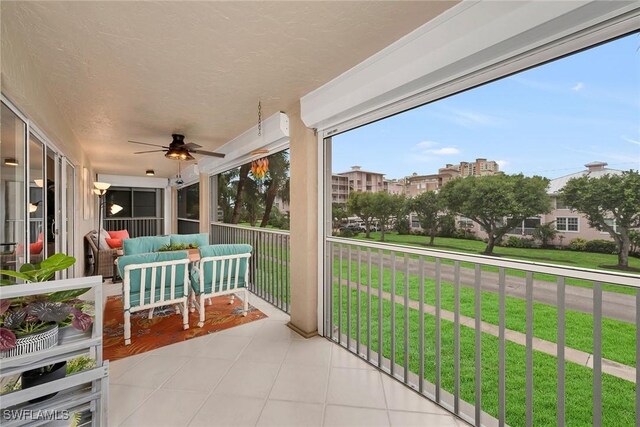 1020 Swallow Ave Unit 102, Marco Island, FL 34145 - view of patio with outdoor lounge area and ceiling fan