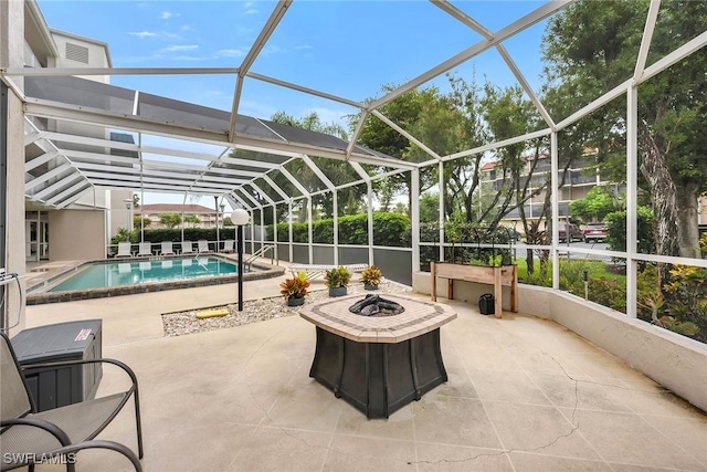 1020 Swallow Ave Unit 102, Marco Island, FL 34145 - view of swimming pool with a fire pit, a patio area, and a lanai