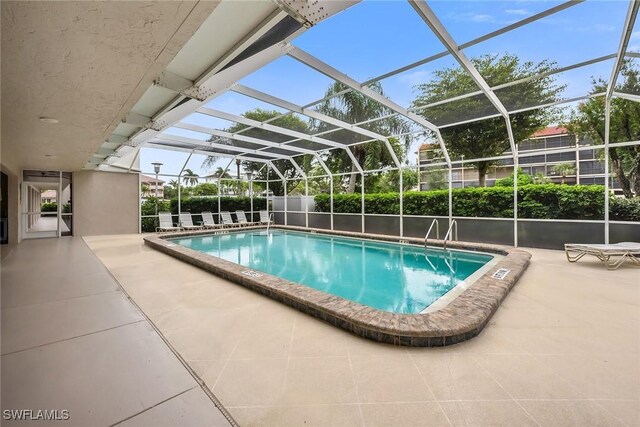 1020 Swallow Ave Unit 102, Marco Island, FL 34145 - community pool with a patio area and a lanai
